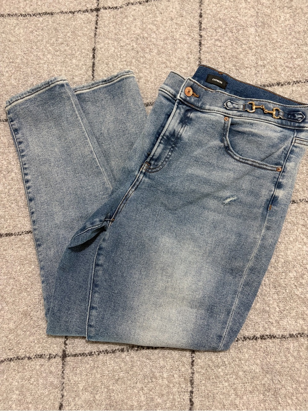Express Light Blue Skinny Jeans with Gold Chain Accent